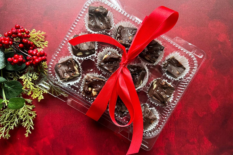 box of dark chocolate macadamia nut fudge.