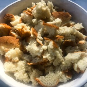 ripped bread in a bowl.