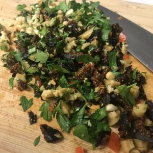 chopped ingredients for stuffing on cutting board