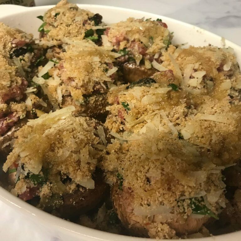 All the stuffed mushrooms covered with breadcrumbs