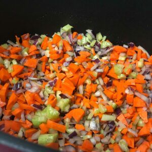 chopped veggies in a pot.