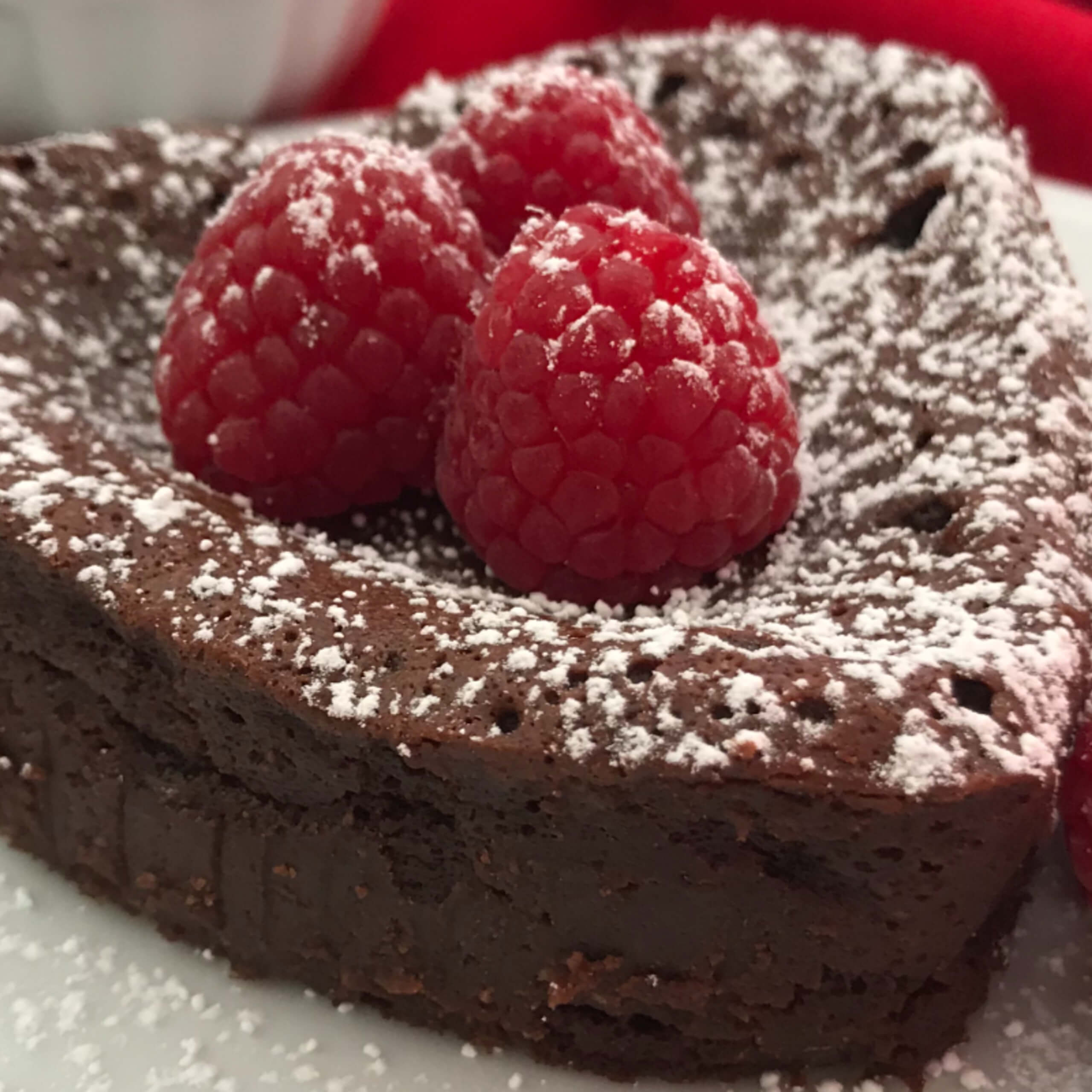 Flourless Chocolate Torte with Fresh Raspberries & Whipped Cream | My Curated Tastes