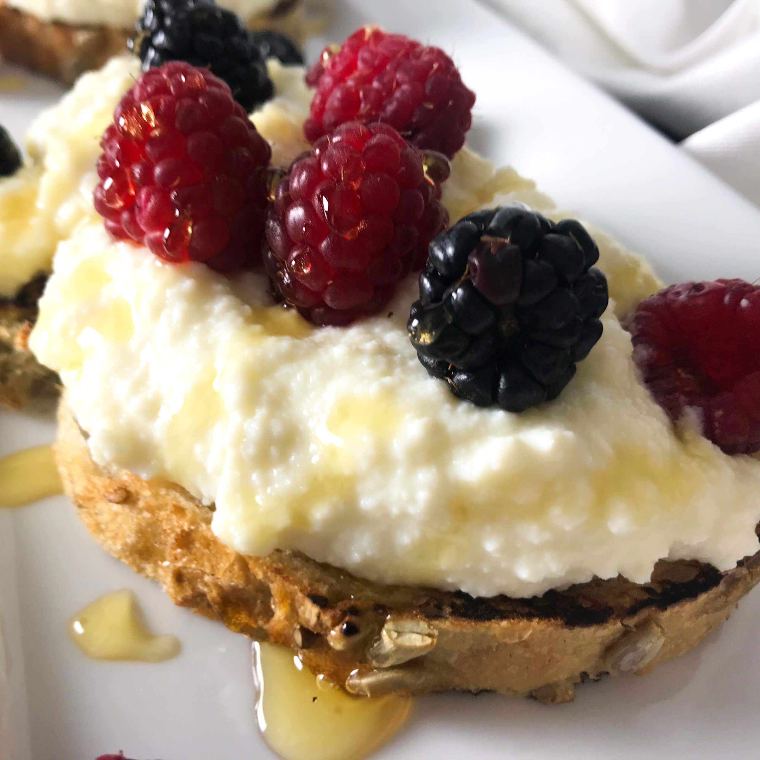 Whipped Ricotta Toast with Berries & Honey | My Curated Tastes