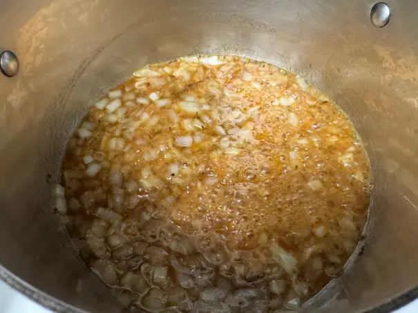 dressing cooking in pot.