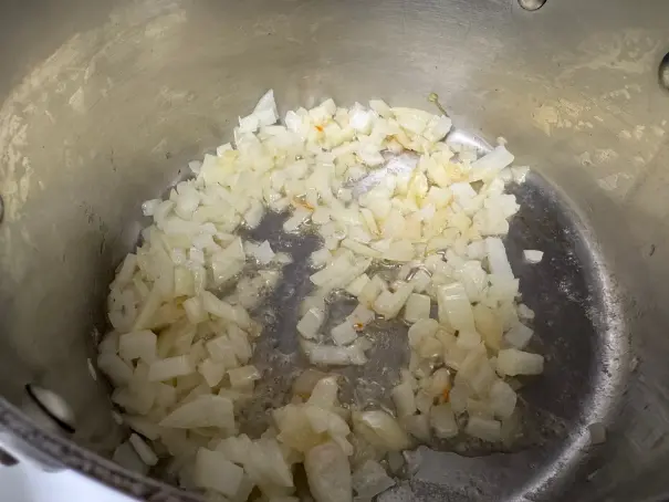 onion cooking in a pot.