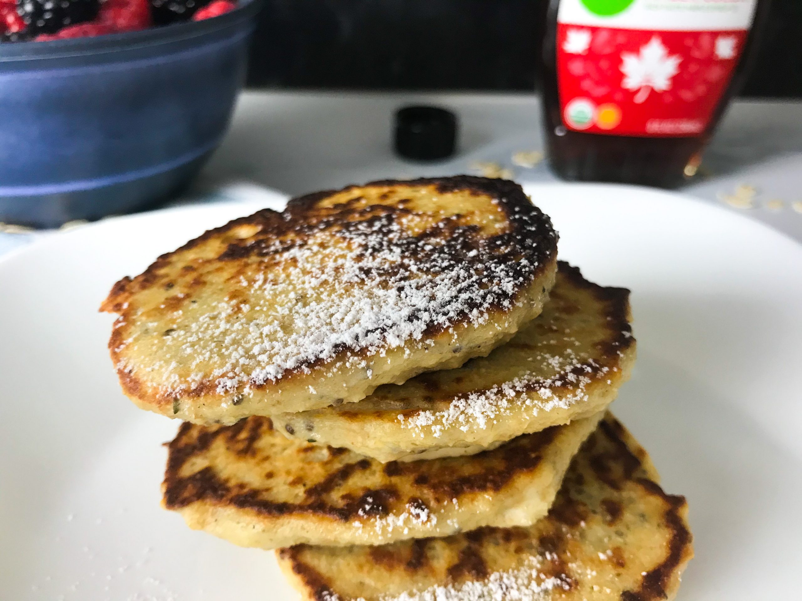 Light Healthy Oatmeal Pancake with powdered sugar | My Curated Tastes