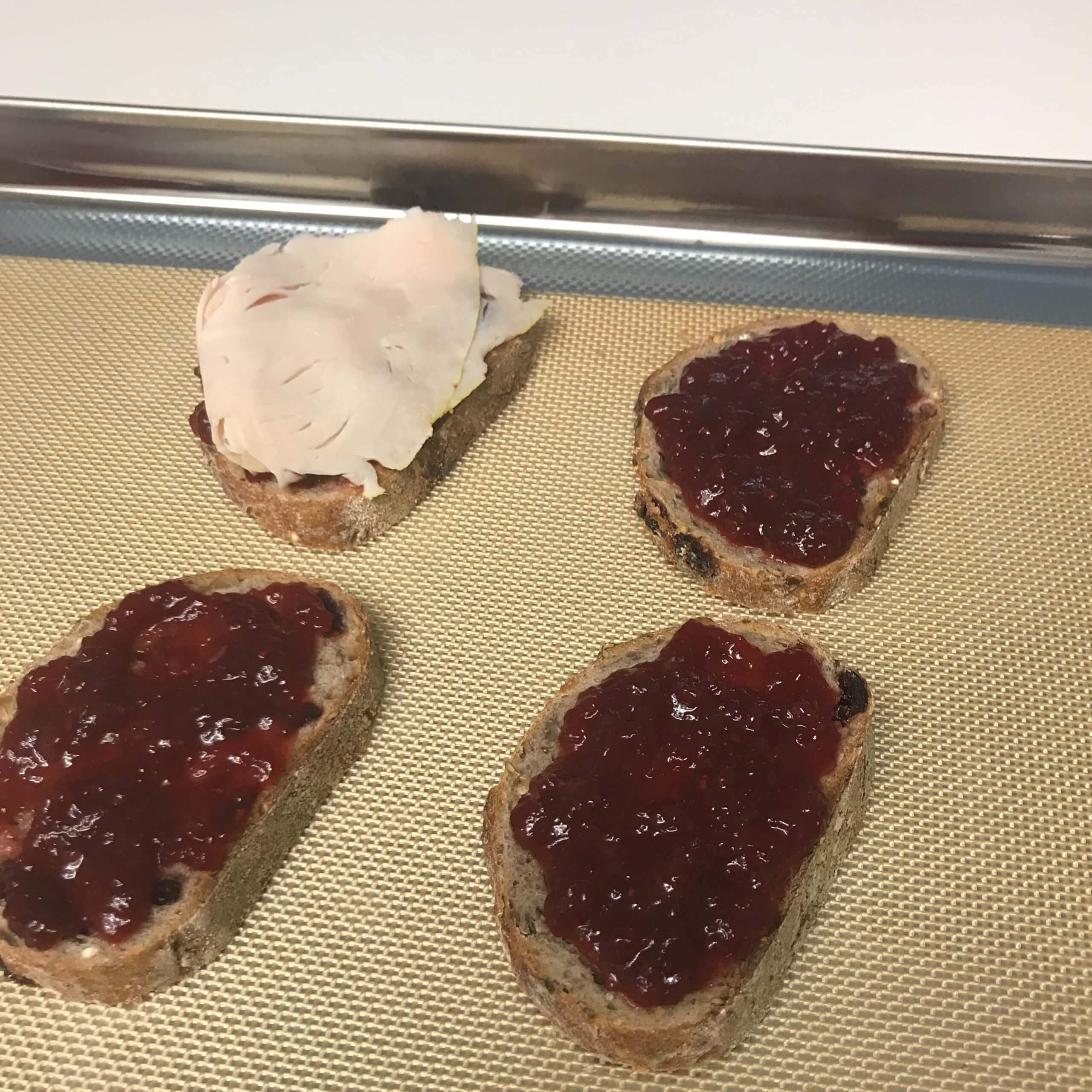 Turkey & Brie bites with Raspberry Sriracha Jam on Walnut Raisin Bread | My Curated Tastes