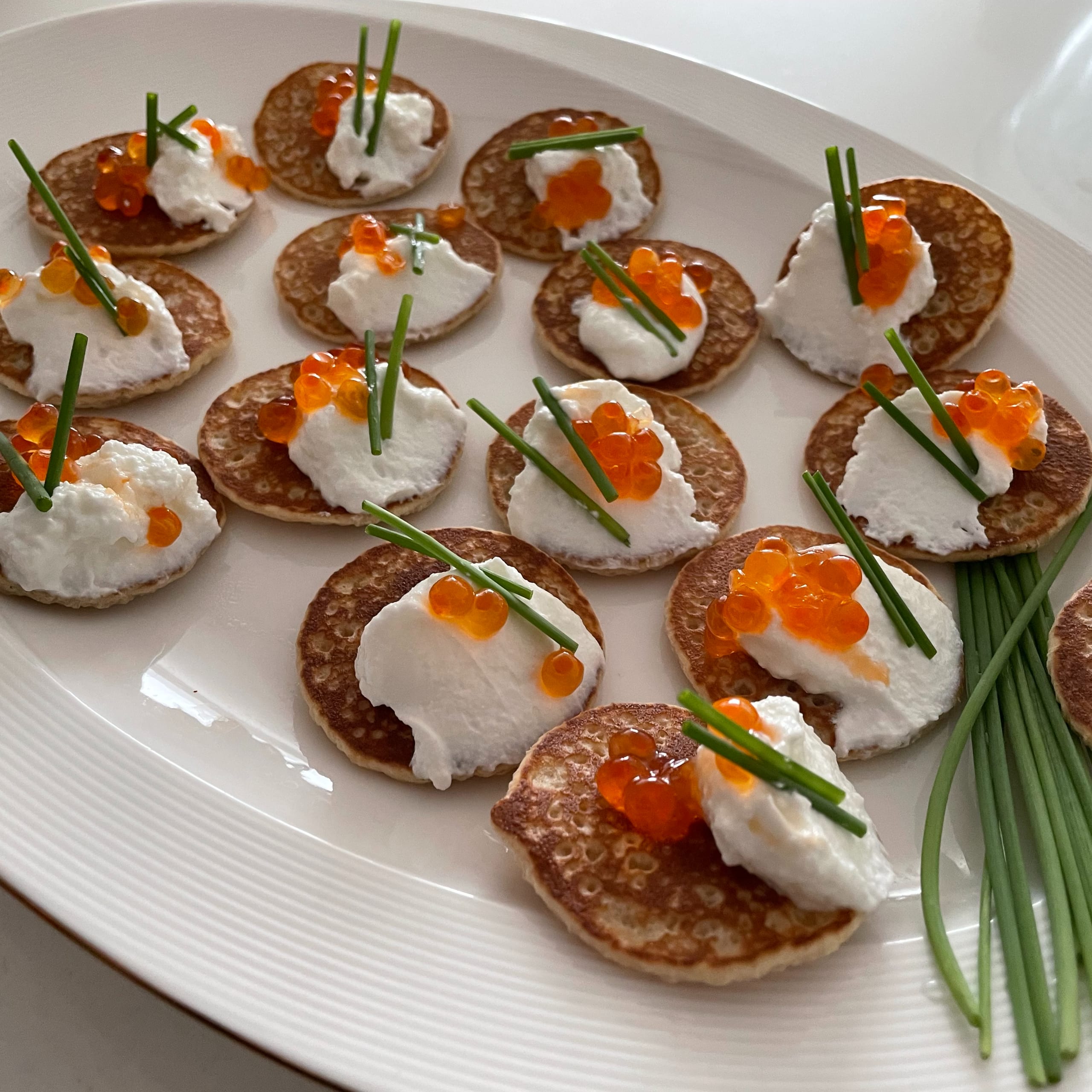 Blini with Fat Free Greek Yogurt, Salmon Roe & Chives | My Curated Tastes