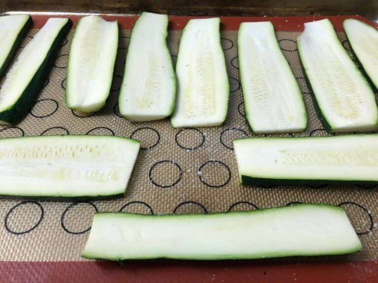 zucchini slices on a baking sheet