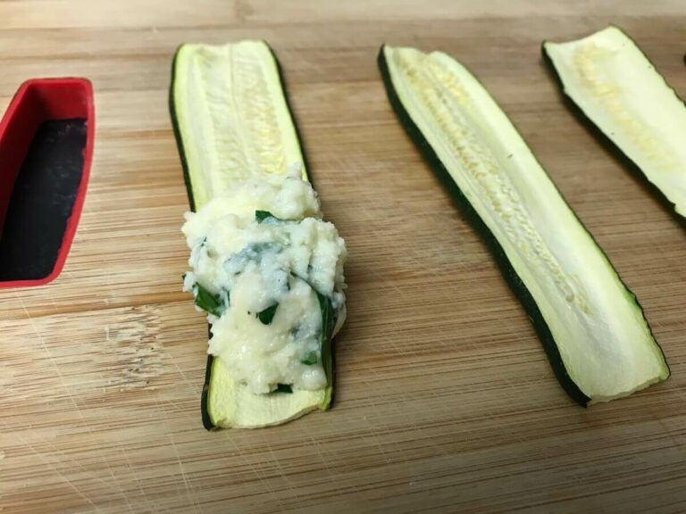 zucchini strip with filling on one end