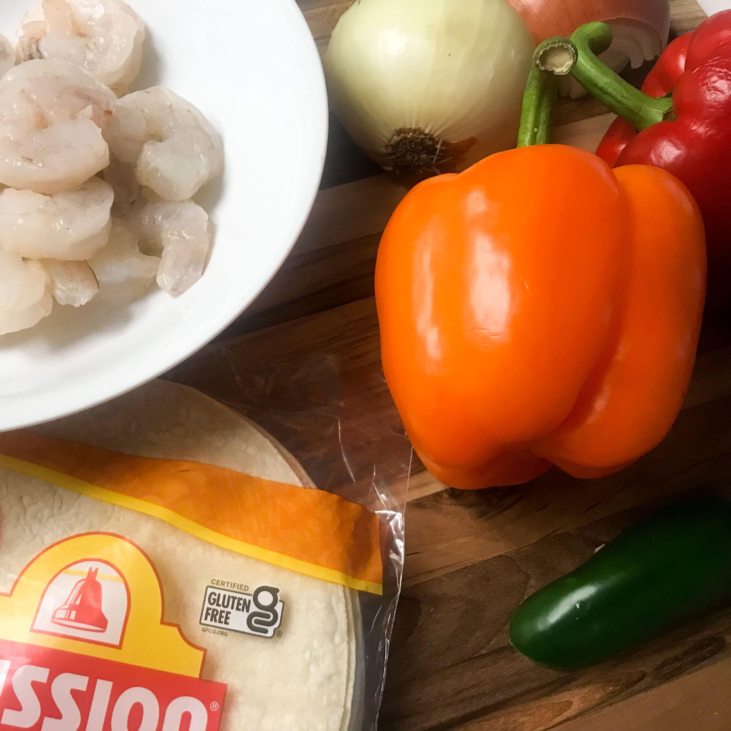 ingredients for shrimp fajitas on the kitchen counter
