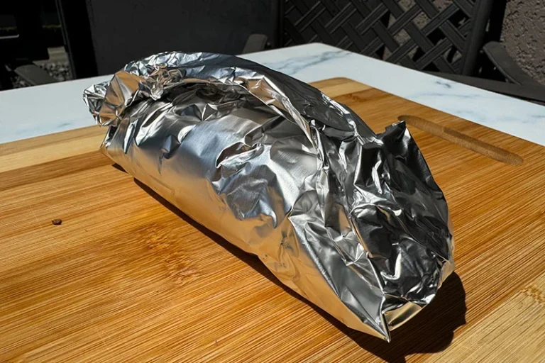 foil wrapped potato ready for grill.