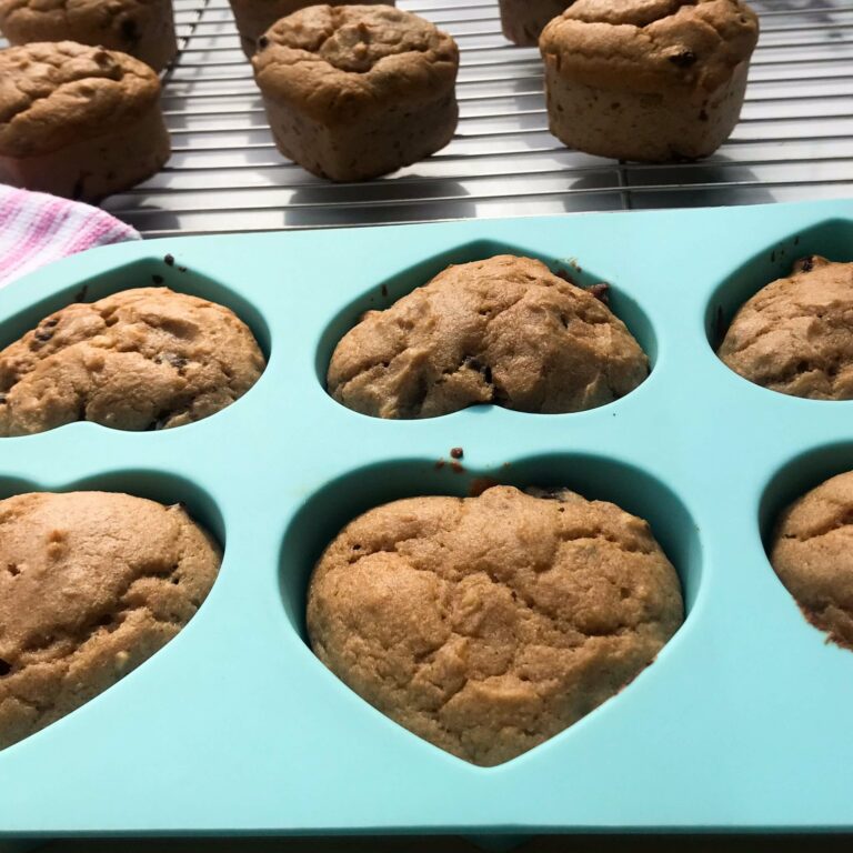 baked muffins in heart shaped muffin pan.