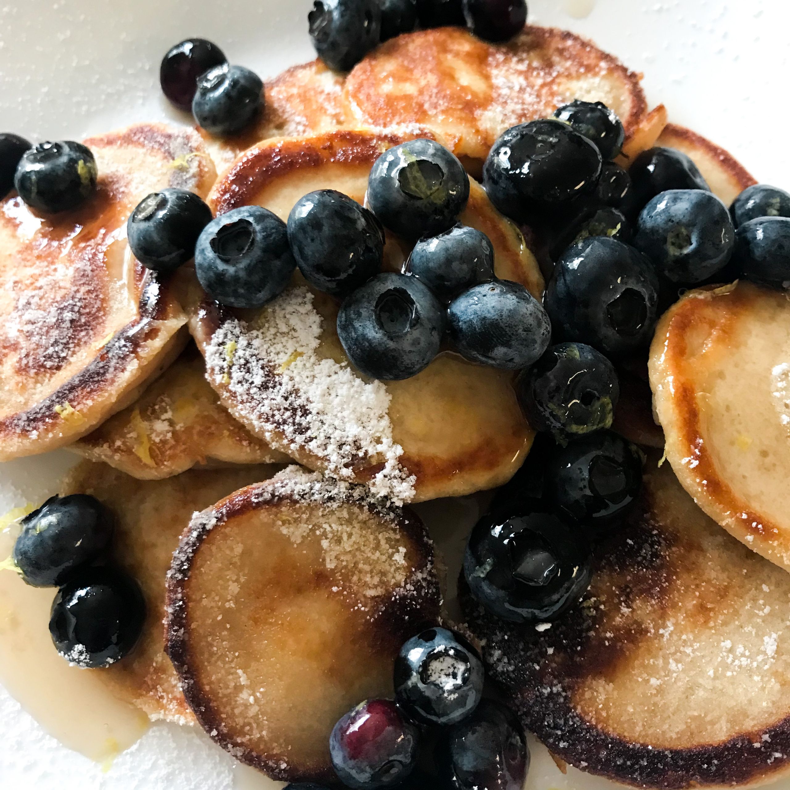 stack of lemon pancakes with blueberries
