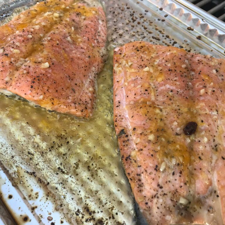 cooked salmon on a baking sheet