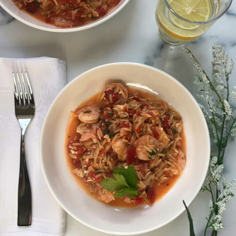 bowl of Greek style shrimp, feta and orzo.