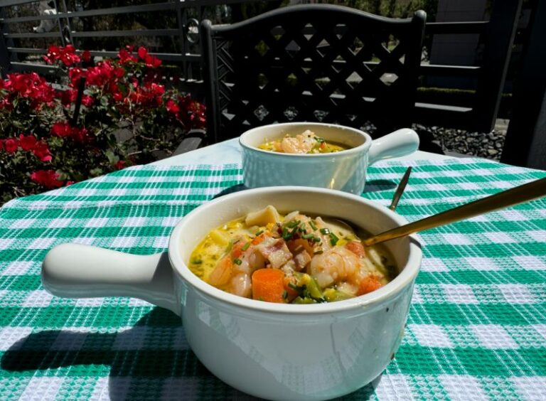 shrimp and lobster chowder in bowls.