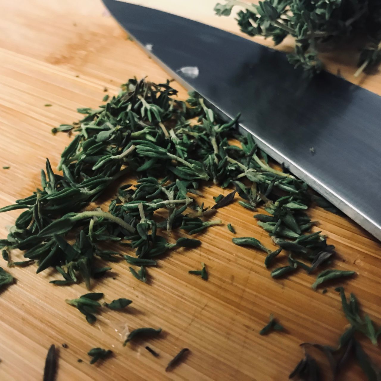 Herbs on cutting board | My Curated Tastes