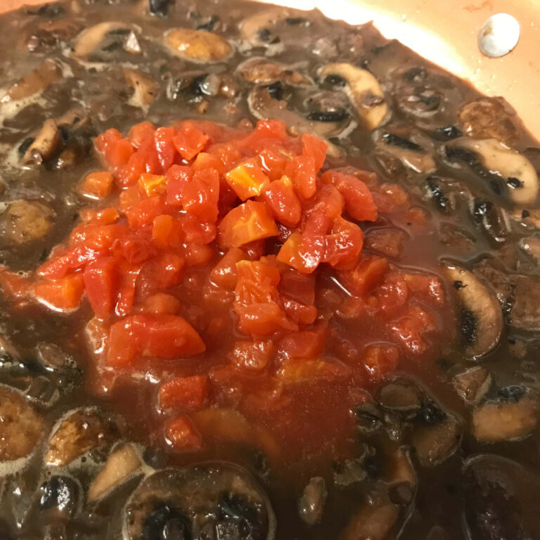 tomatoes added to sauce.