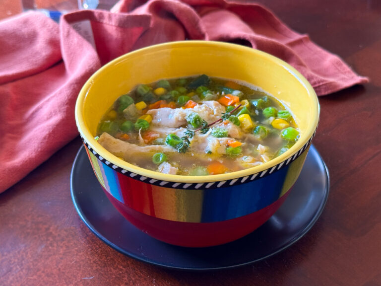 chicken and rice soup in a bowl.