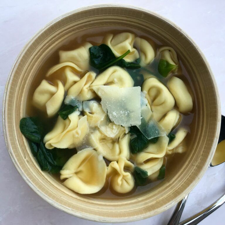 bowl of spinach and cheese tortellini soup
