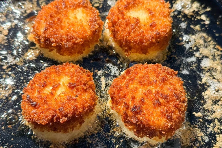 brie frying in skillet.