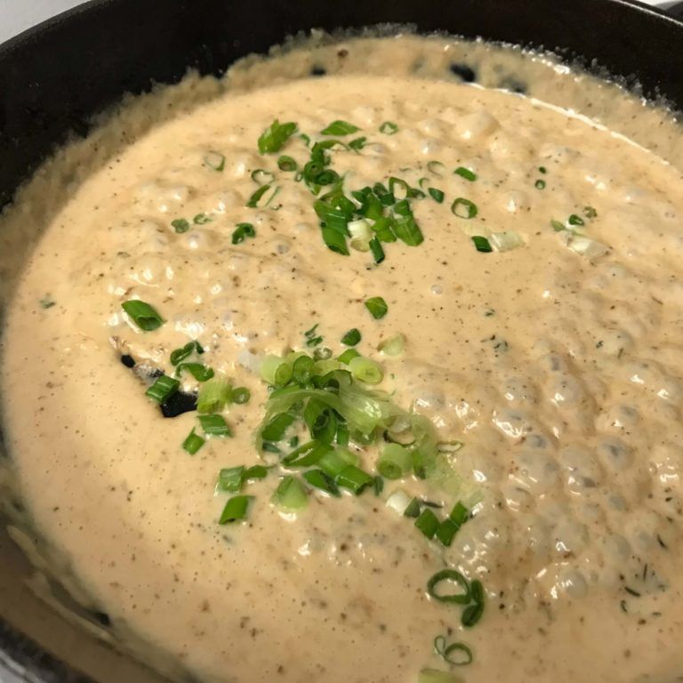 blue cheese sauce with green onions added.