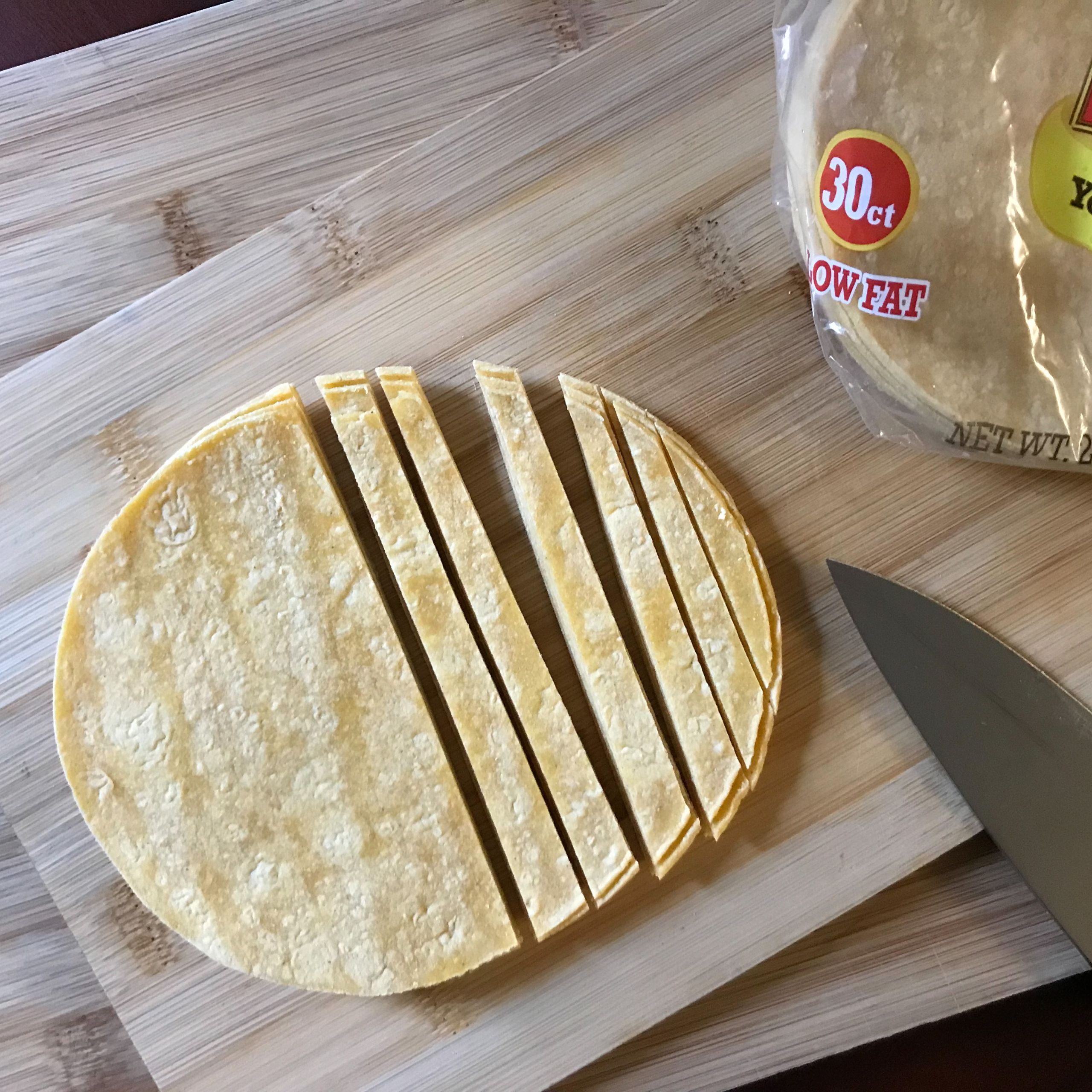 partially cut tortillas on boarrd | my curated tastes