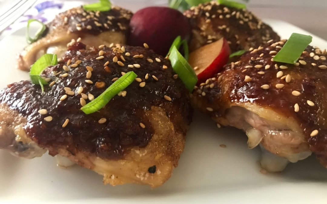 PLUM GLAZED CHICKEN THIGHS ON A PLATE | MY CURATED TASTES
