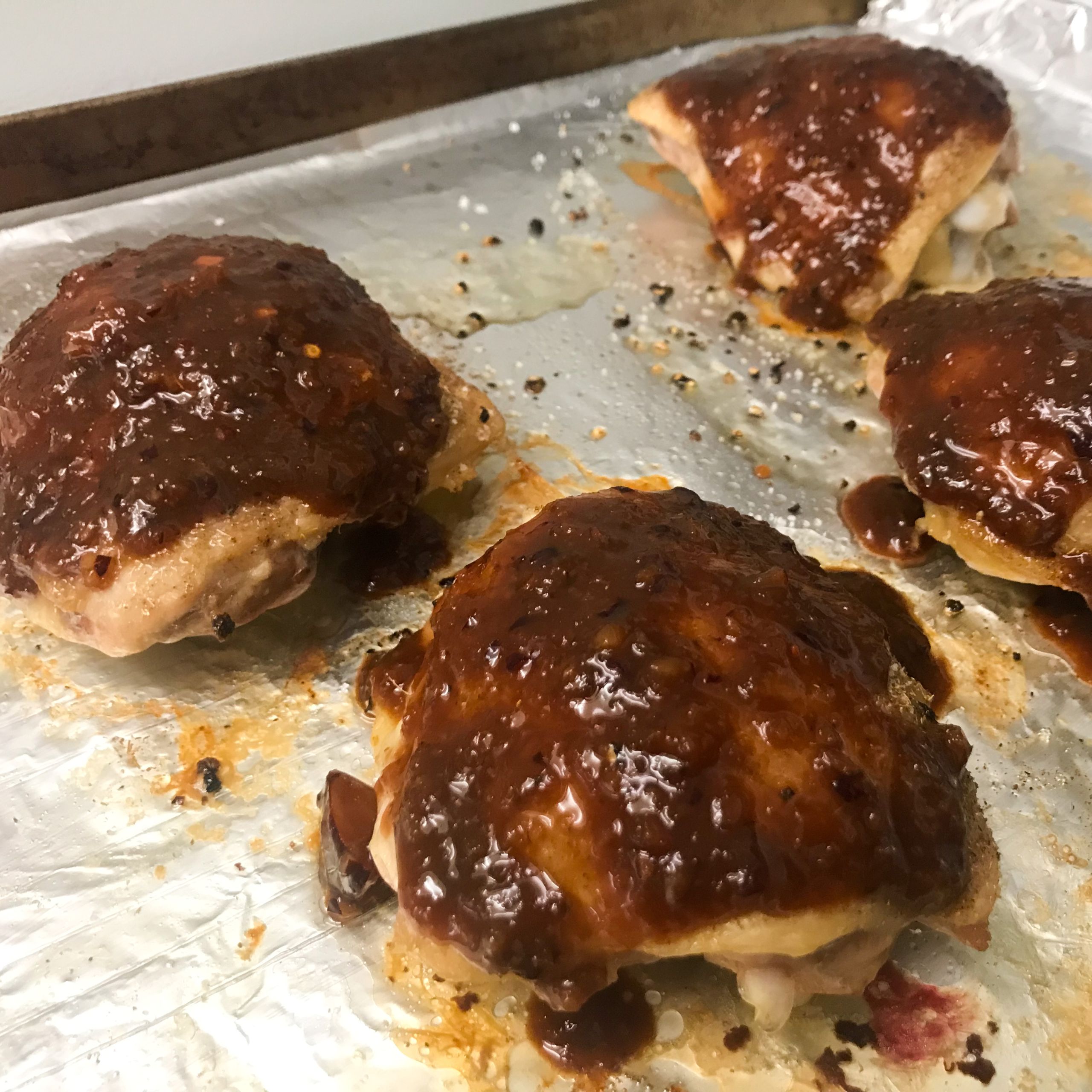 cooked chicken thighs with plum sauce | my curated tastes