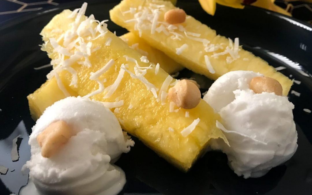 plate of pineapple, coconut sorbet, macadamia nuts and shaved coconut