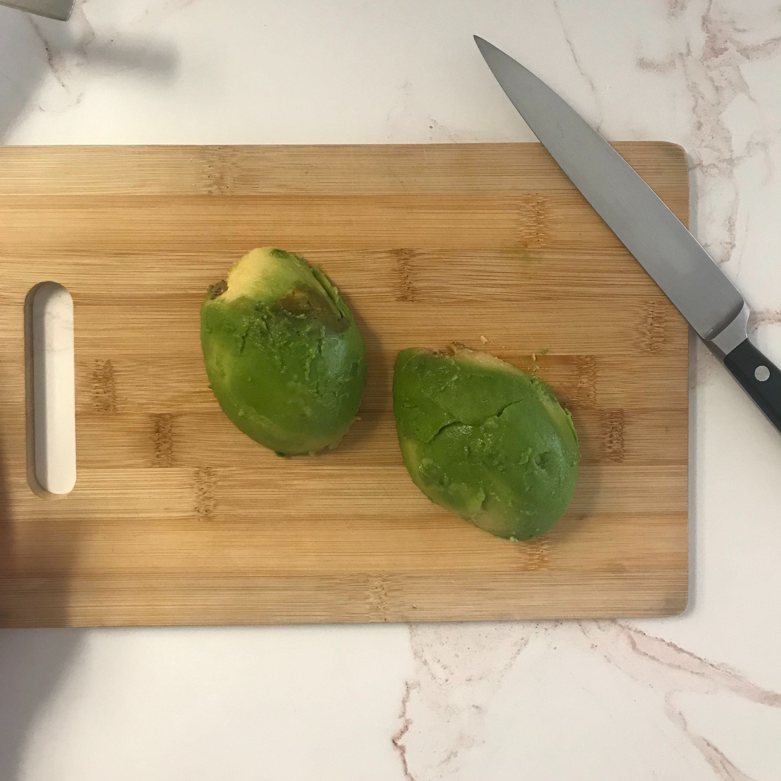 avocado on cutting board | my curated tastes