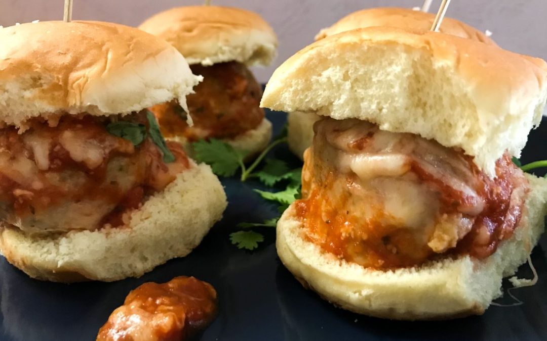 Turkey Meatball Parmesan Sliders on a plate | my curated tastes