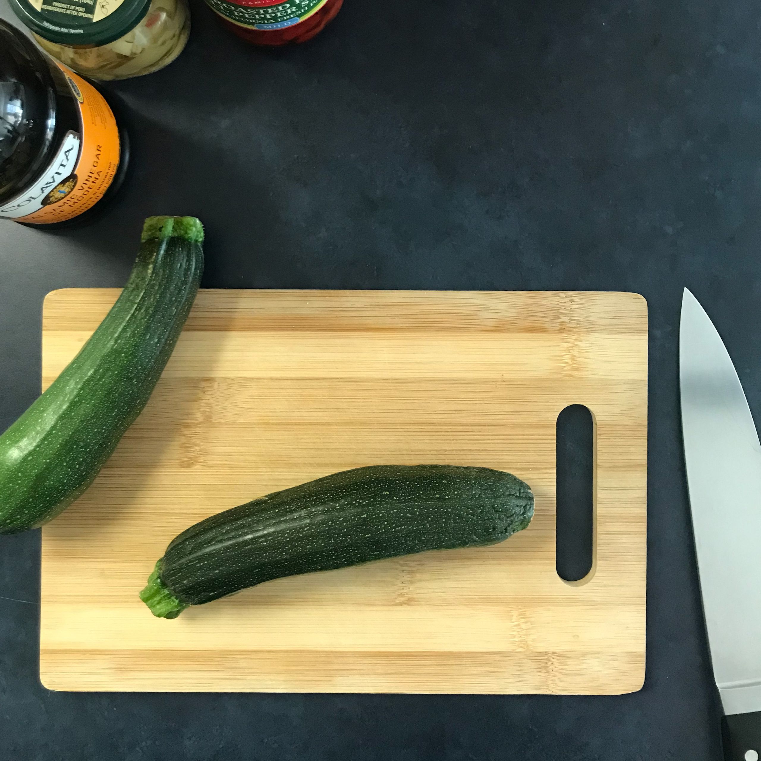 zucchini and knife on a board | my curated tastes