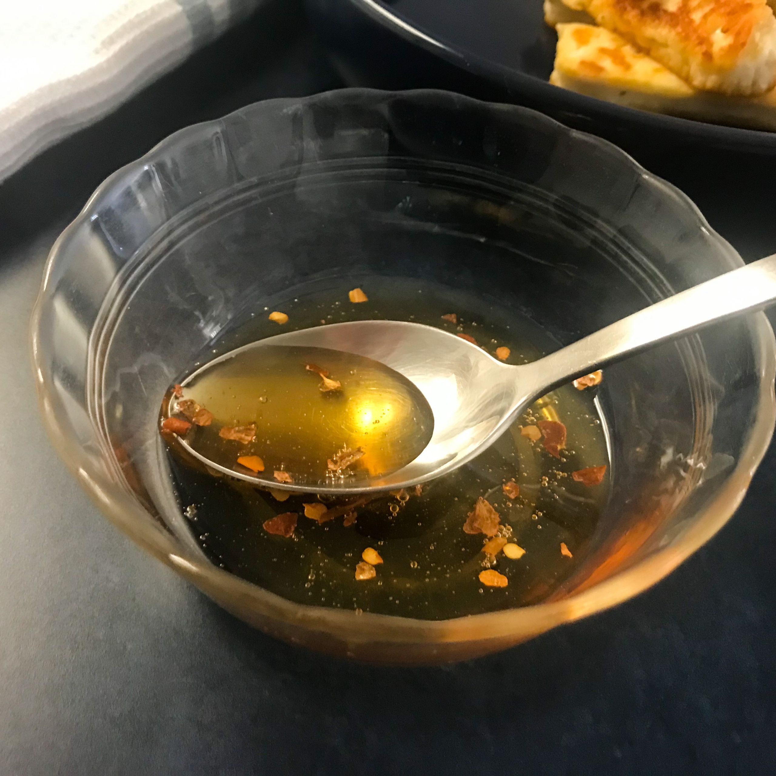 honey and chili flakes in a bowl