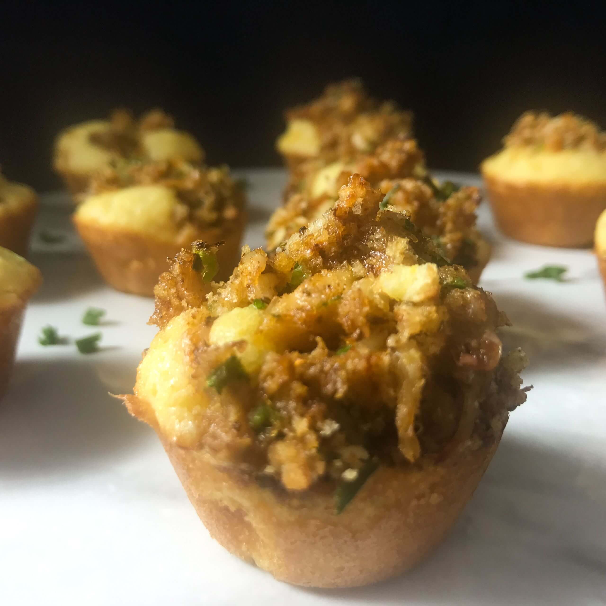 UPCLOSE PHOTO OF COOKED CRABBY MINI CORN MUFFINS
