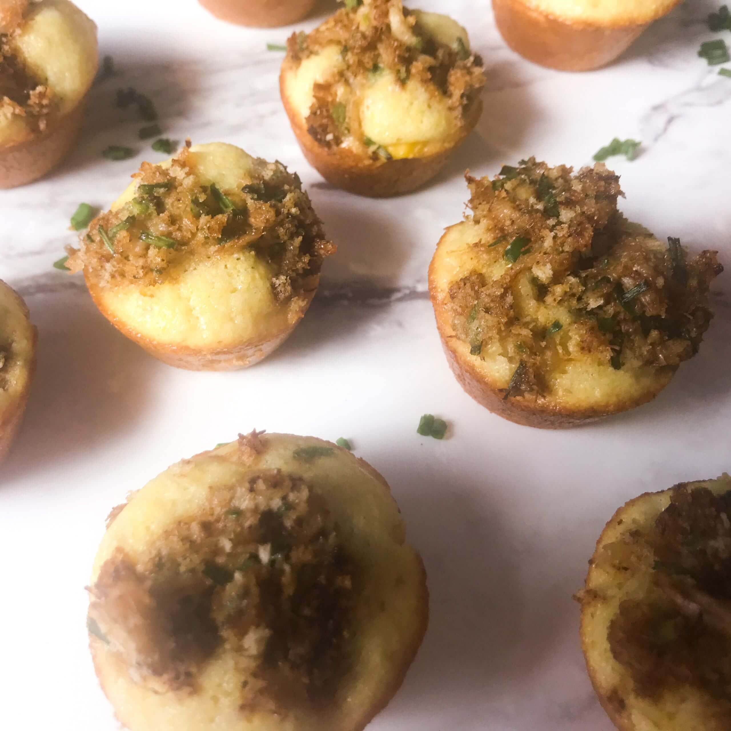 BAKED CRABBY MINI CORN MUFFINS ON A PLATTER