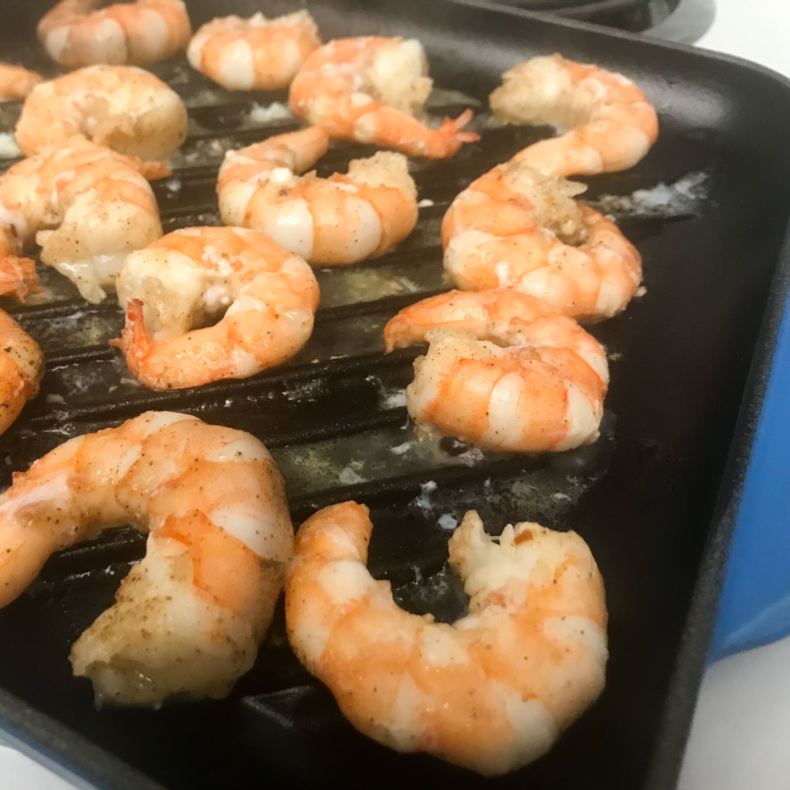 shrimp grilling on pan