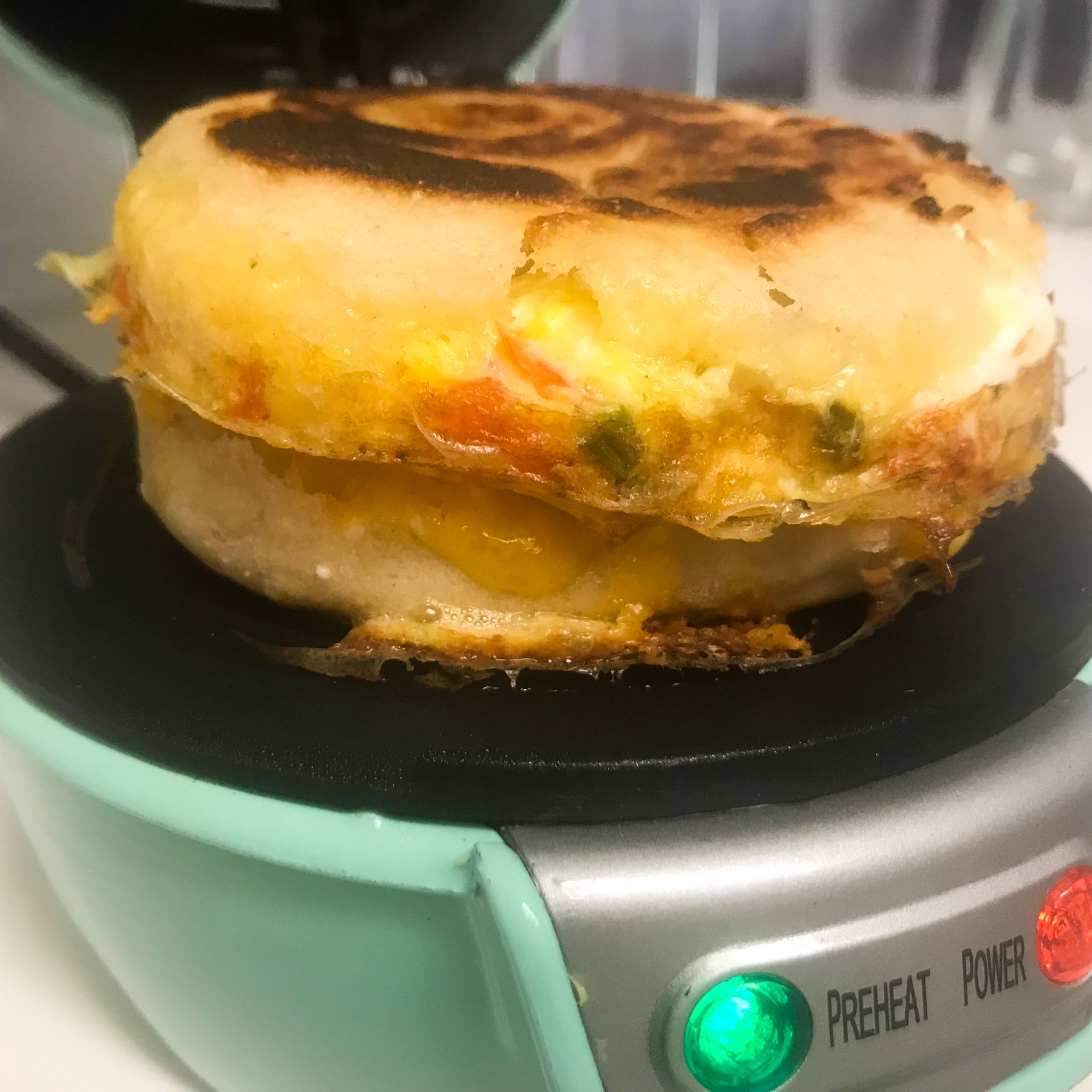 Finished tex-mex breakfast sandwich in the sandwich maker