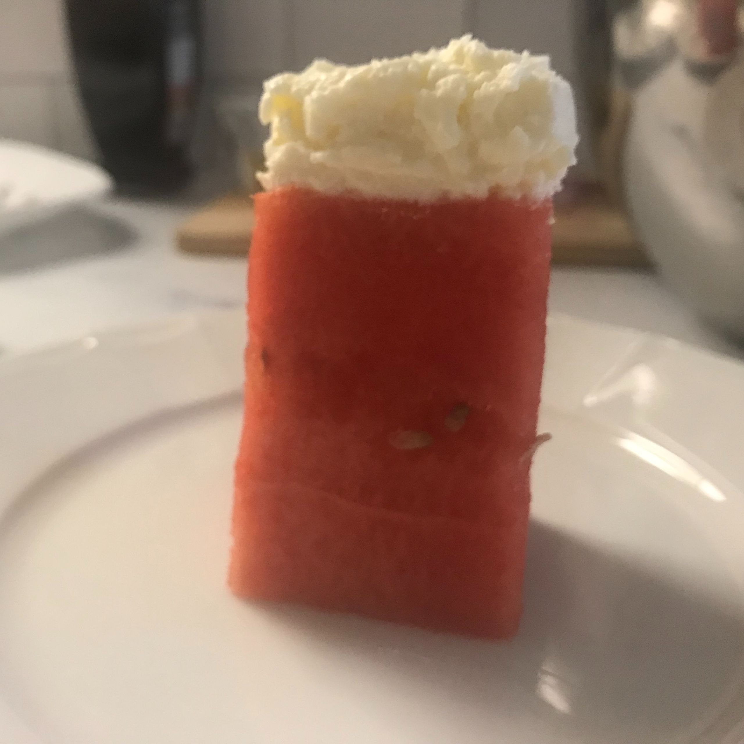 watermelon rectangle topped with whipped feta