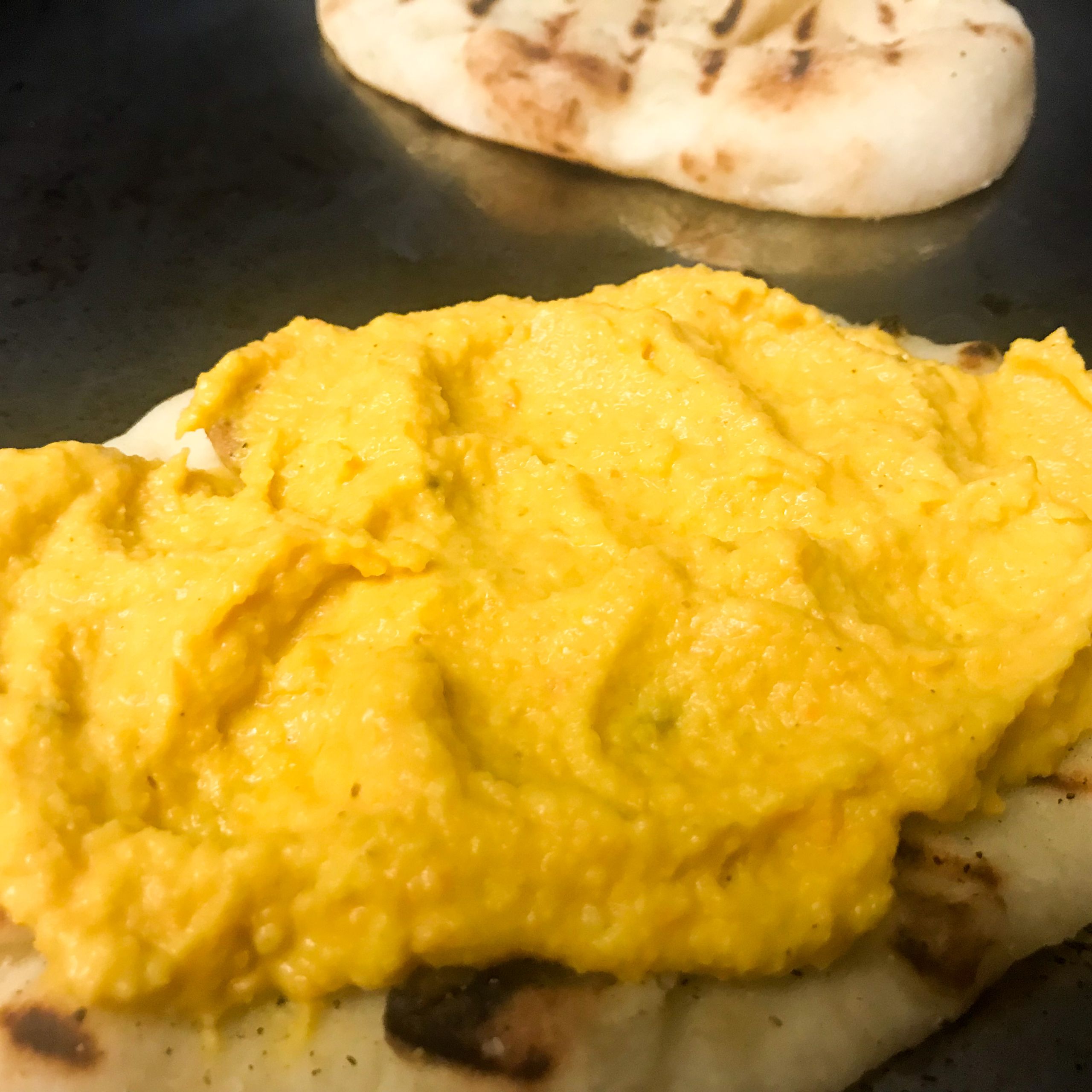 naan smeared with vadouvan vegetable puree
