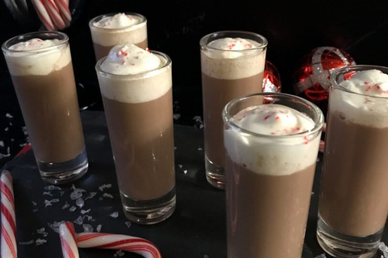 Glasses of hot chocolate peppermint shots.