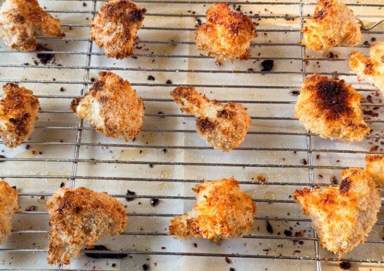 baked cauliflower bites on a rack.