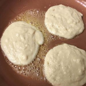 pancake batter in skillet