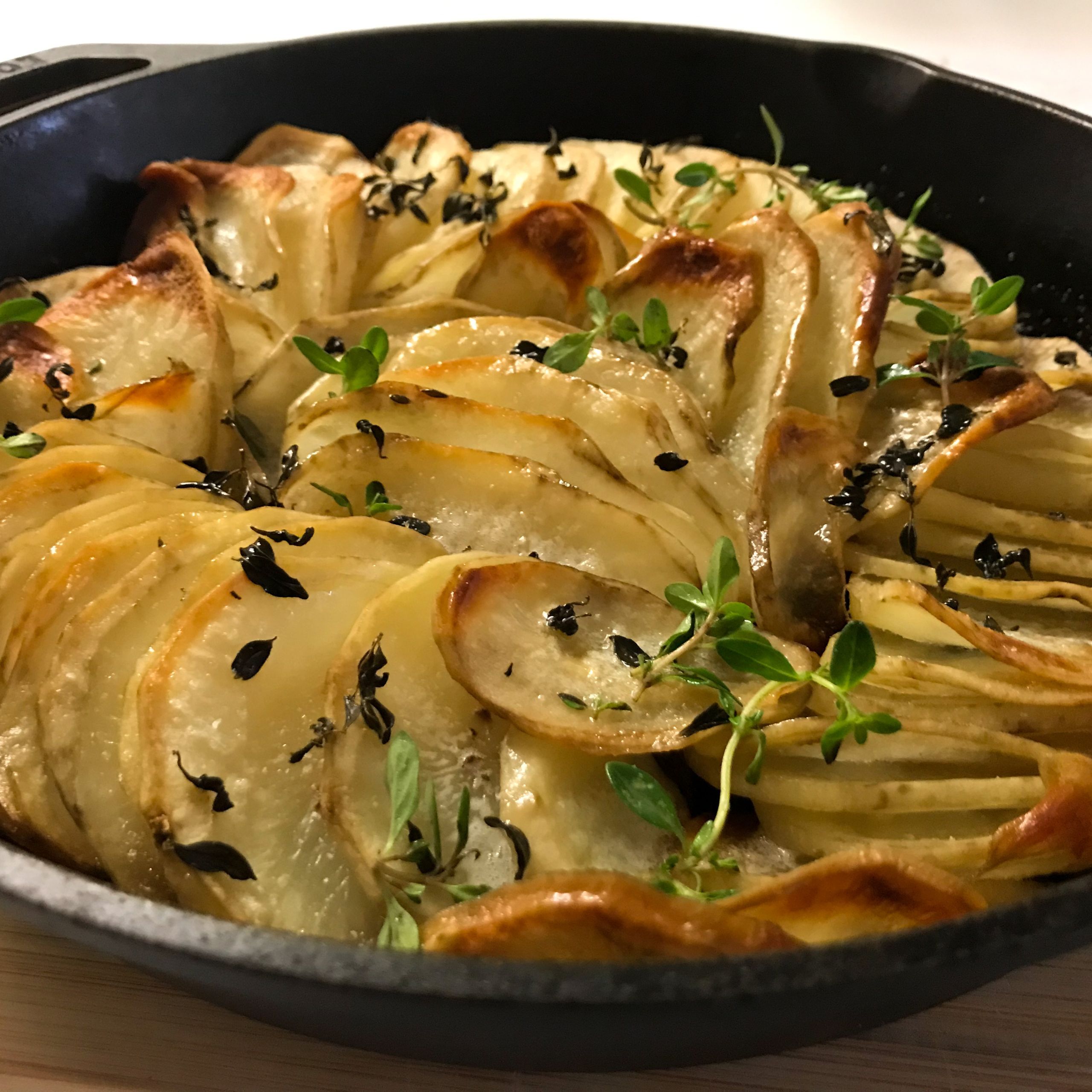 pan of crispy garlic potatoes | my curated tastes