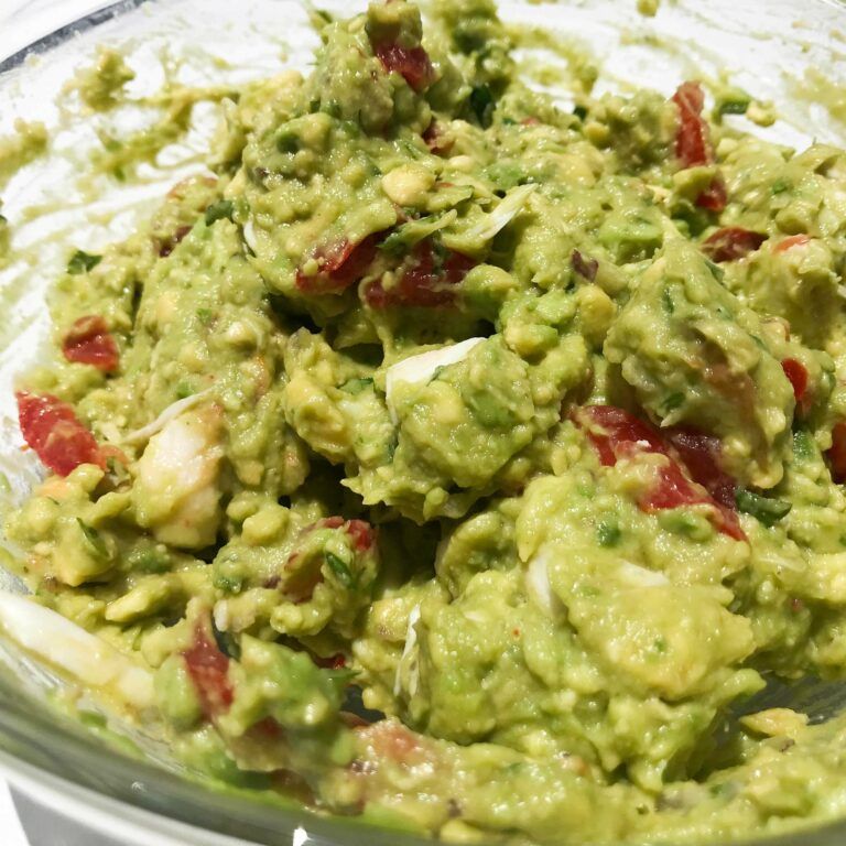avocado mixed with other ingredients in a bowl