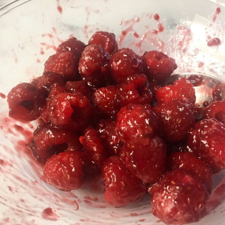 bowl of glazed raspberries.