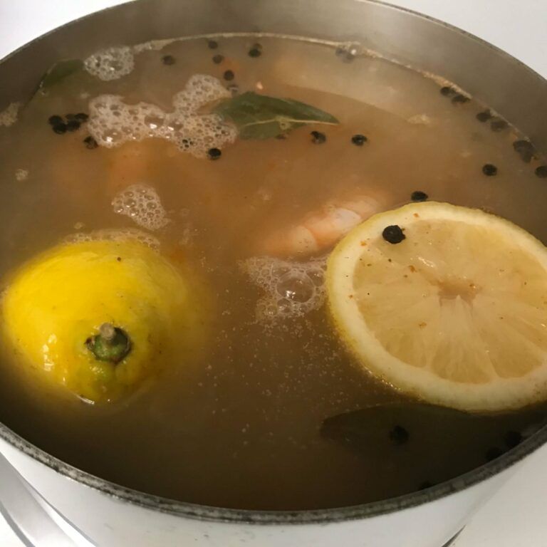 shrimp boiling in seasoned water.