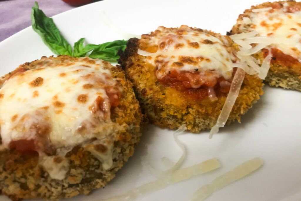 Crispy Eggplant Parmesan Slices on a plate.