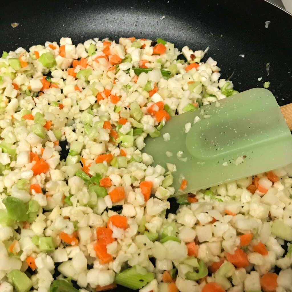 confetti cauliflower in a skillet.